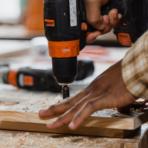 A power drill being used